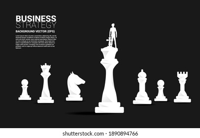 Silhouette of businessman on chess piece king. Business Concept of strategy planning and success