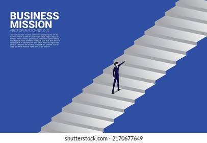 Silhouette of businessman point finger on stair. Concept of people ready to up level of career and business.