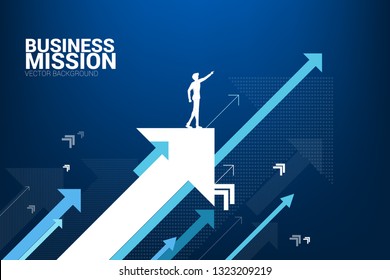 Silhouette of businessman point forward on moving up arrow. concept of growth business and leadership.