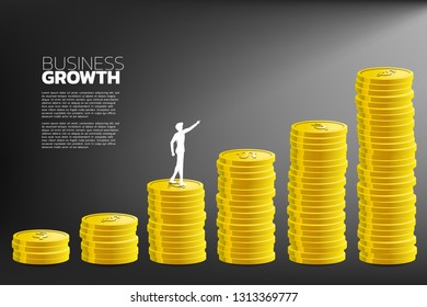 silhouette of businessman point to higher stack of coin. Concept of growth business, Success in Career path.