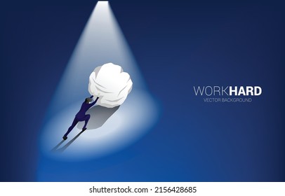 Silhouette of businessman pushing the rock in highlight. Concept of business challenge and work hard.
