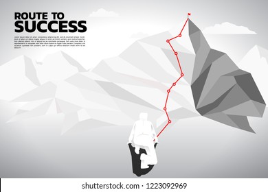 Silhouette of businessman ready to run follow the route path to top of mountain. Concept of people ready to start career and business to success.