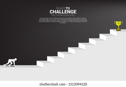silhouette of businessman ready to run to trophy at top of stair. Concept of vision mission and goal of business