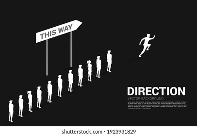 Silhouette  businessman running from group of businessman queue with direction. Concept of business company and team direction