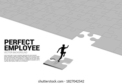 Silhouette of businessman running on final jigsaw piece. Concept of perfect recruitment. Human Resource. put the right man on the right job.