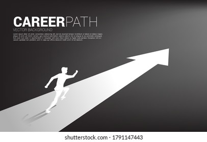 Silhouette of businessman running on forward arrow. Concept of career path and start business