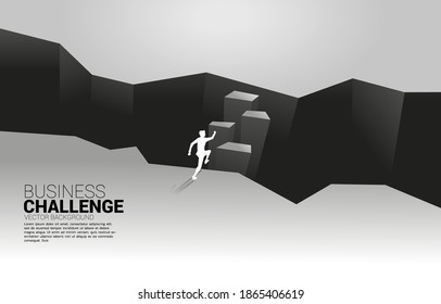 silhouette of businessman running on  step forward to abyss. concept of business challenge and courage man