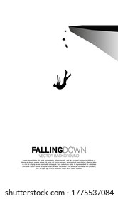 silhouette of businessman slip and falling down from the cliff. Concept for fail and accidental business