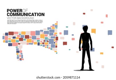 Silhouette of businessman standing with Big Megaphone from small bubble speech icon. Concept for power of comment and communication.