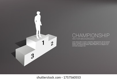 Silhouette of businessman standing on first place podium. Business Concept of winner and success