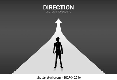 Silhouette of businessman standing on growth graph arrow. Concept of career path and start business