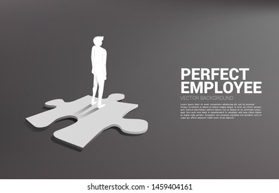 Silhouette of businessman standing on jigsaw piece. Concept of perfect recruitment. Human Resource. put the right man on the right job.