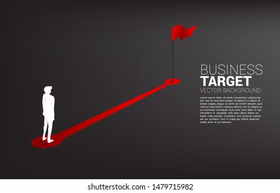 Silhouette of businessman standing on route path to red flag at goal. Concept of people ready to start career and business to success.