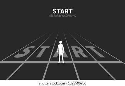 Silhouette of businessman standing at start line. Concept of people ready to start career and business