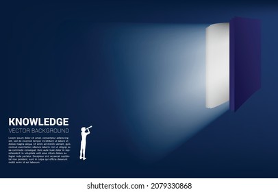 Silhouette of businessman and telescope looking to exit door from open book. Concept of knowledge of book