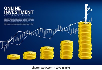 Silhouette of businessman use mobile phone standing on top of growth graph with stack of coin. Concept of online investment and growth in business