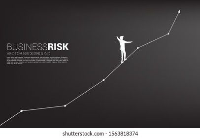 Silhouette Of Businessman Walking On Rope Walk Way Up To Growth Line Graph.Concept For Business Risk And Career Path