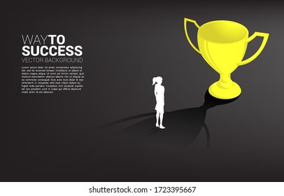 Silhouette businesswoman aim to champion trophy. Business Concept of leadership goal and vision mission