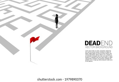 Silhouette of businesswoman at dead end of maze. Business concept for problem and wrong decision.