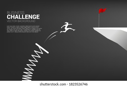 Silhouette of businesswoman jump to red flag on cliff with springboard. Concept of boost and growth in business.