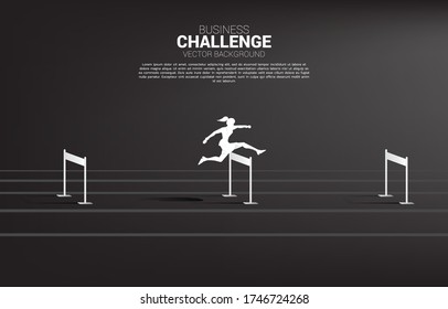 Silhouette businesswoman jumping across hurdles obstacle. Background concept for Obstacle and challenge in business