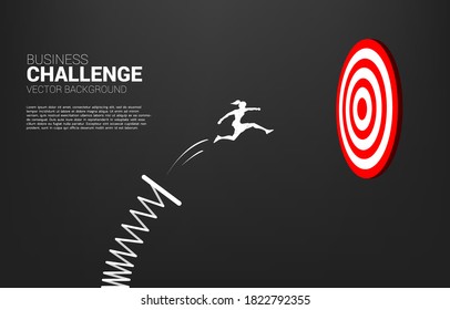 silhouette of businesswoman jumping to target dartboard with springboard,. Business Concept of targeting and customer.route to success.