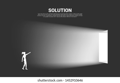 Silhouette of businesswoman point forward to exit door. Concept of career start up and  business solution.