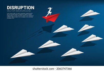 Silhouette of businesswoman running on red origami paper airplane go different way from group of white. Business Concept of disruption and vision mission.