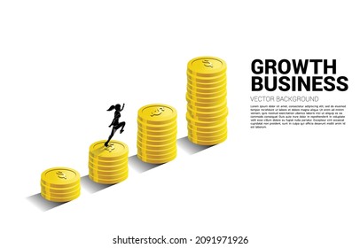 Silhouette of businesswoman running to top of stack of coin. Concept of success investment and growth in business