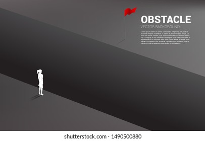 silhouette of businesswoman standing at abyss looking to goal. concept of business challenge and obstacle