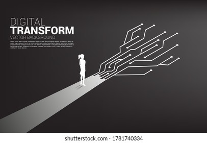 Silhouette of businesswoman standing on the way with dot connect line circuit. concept of digital transformation of business.