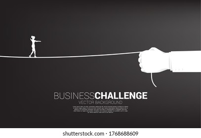 silhouette of businesswoman walk rope in businesswoman hand. Concept of Business challenge and career path.