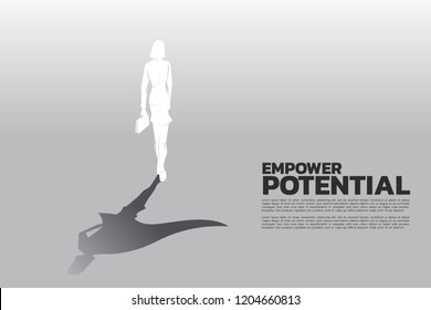 Silhouette of businesswomen with briefcase and his shadow of superhero. concept of empower potential and human resource management