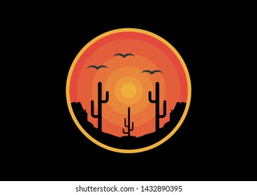 silhouette of a cactus tree against a background of sunset