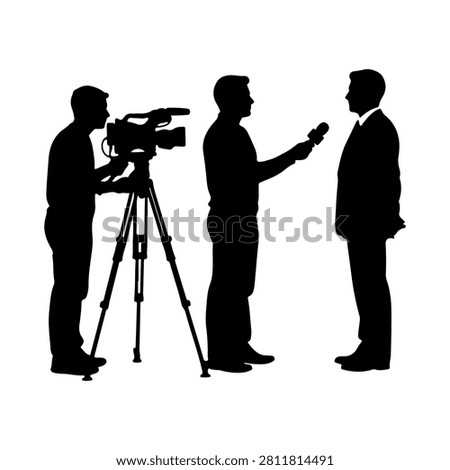 Silhouette of camera crew filming interview with businessman in formal suit during professional discussion