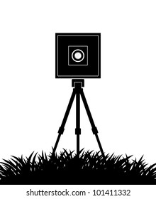Silhouette of camera on white background