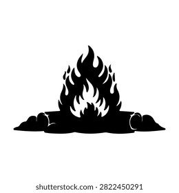Silhouette of a campfire with flames rising amidst rocks, creating a warm and inviting outdoor atmosphere during nighttime.