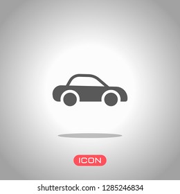 Silhouette of car, small auto icon. Icon under spotlight. Gray background