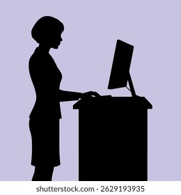  silhouette of a career woman working at a computer