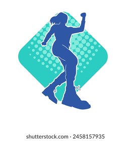 Silhouette of a casual female in a dancing pose. Silhouette of a dancer woman in action pose.