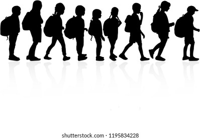 Silhouette of a child with a backpack .