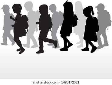 Silhouette of a child with a backpack .