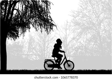 Silhouette of a child on a bike.