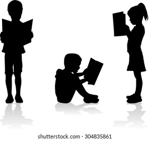 Silhouette of a child reading a book at.