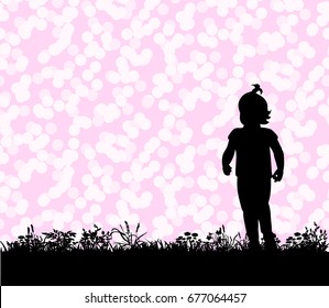  silhouette of a child running along the grass