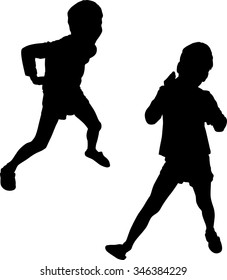 silhouette of children
