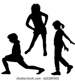 Silhouette of children doing exercises