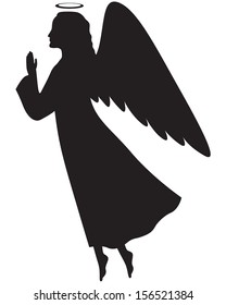 Silhouette Of A Christmas Angel In Profile With Her Hands Folded In Prayer
