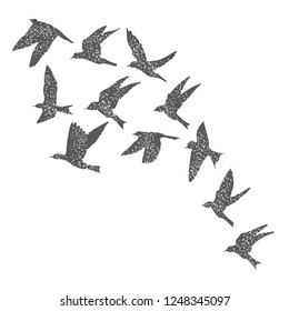 Silhouette of city flying birds on white background. Inspirational body flash tattoo ink. Set of textured stipple grey birds fly swallows, hand made. Vector.