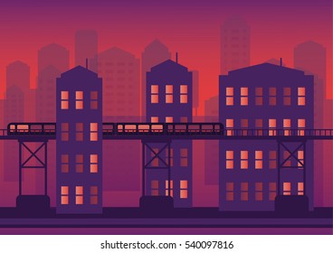 Silhouette of the city at night against the setting sun